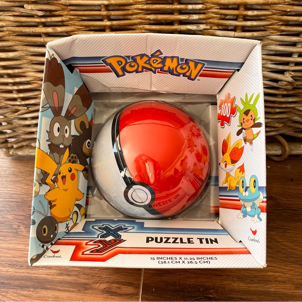 Pokémon round 100 piece puzzle tin